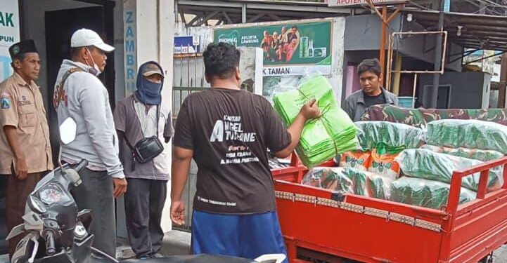 Akhiri KBM Ramadhan, SMP YPM 1 Taman Bagikan 1.000 Paket Beras untuk Warga